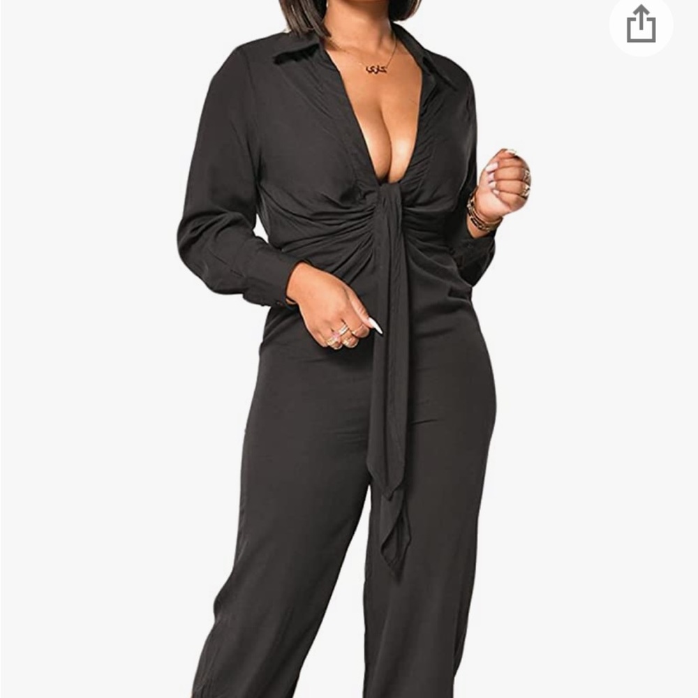 Womens black jumpsuit. 95% polyester 5% spandex. NWOT